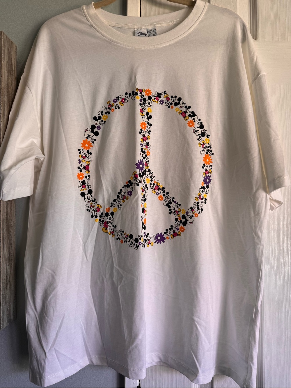 Disney White Tee with Multicolor Floral Peace Sign